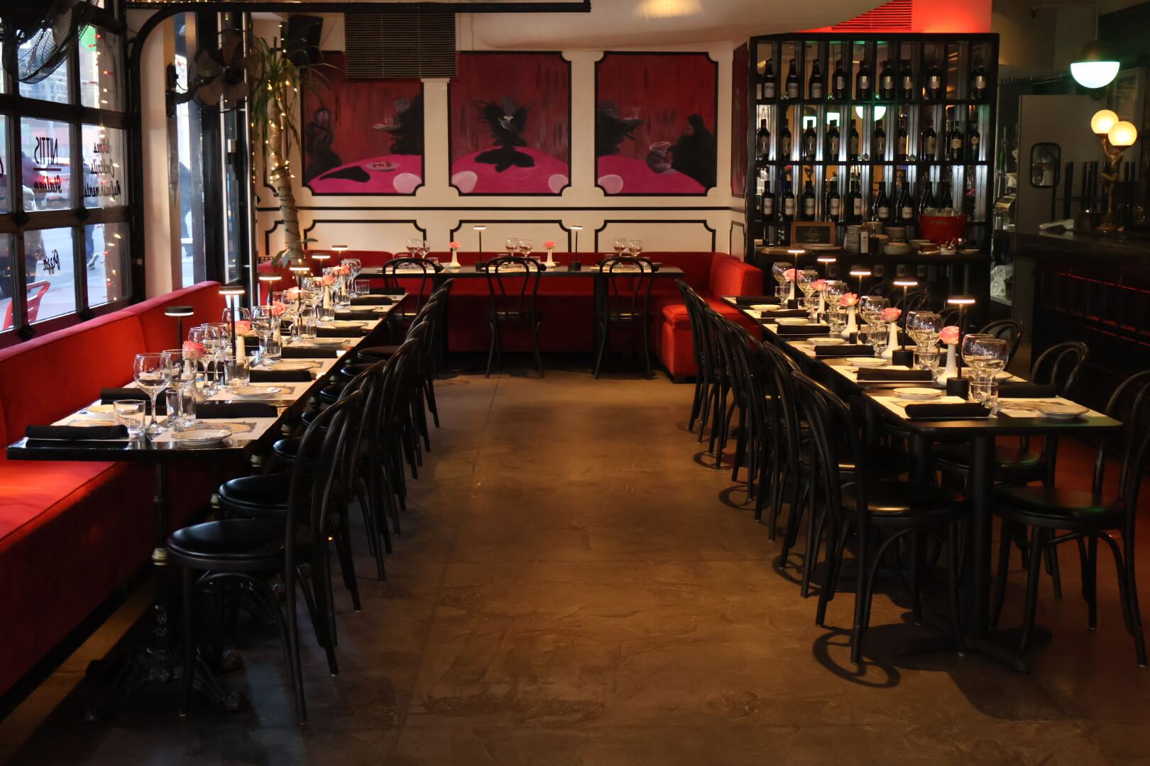 View of tables set up in two rows for a banquet