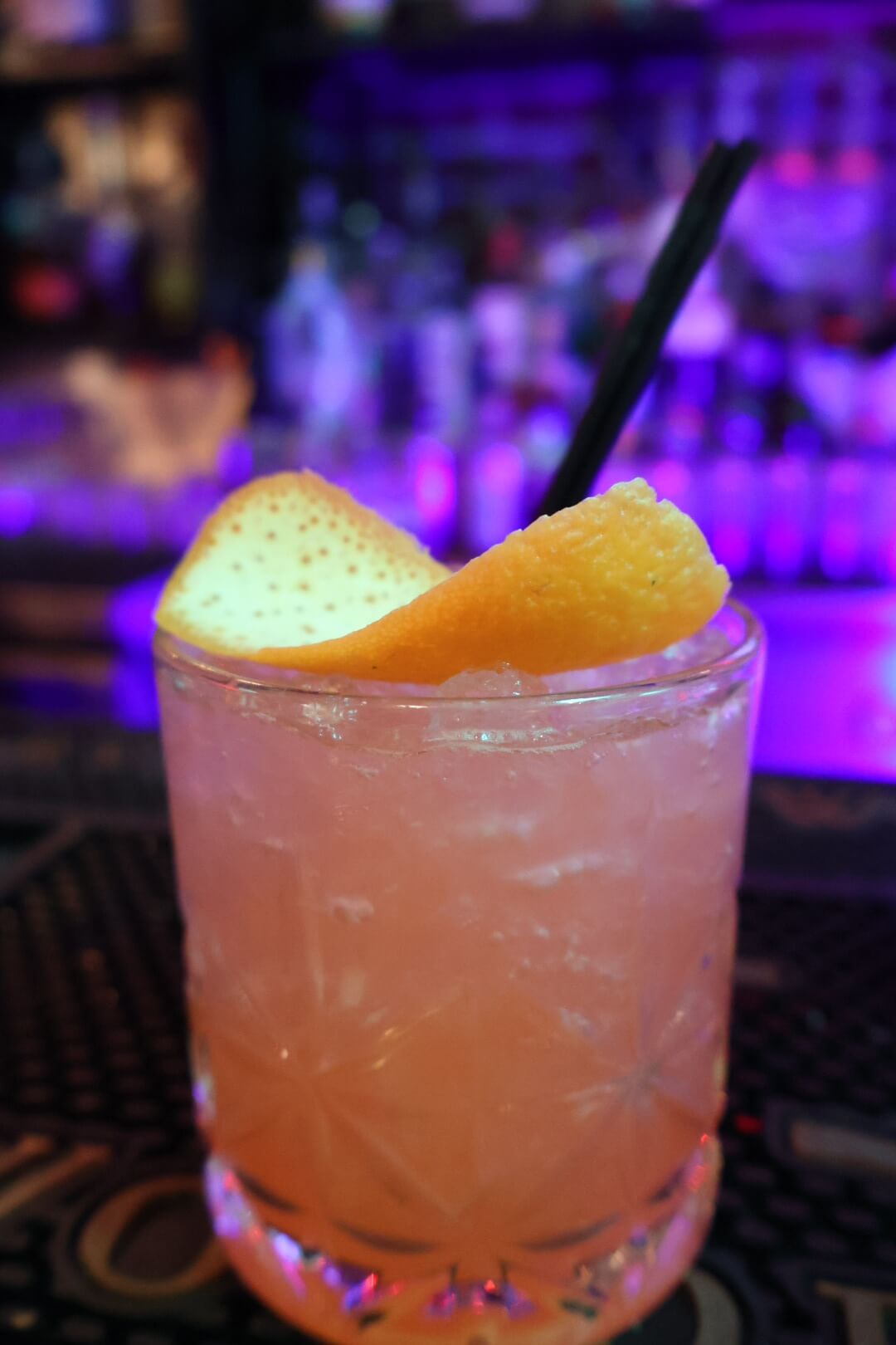 Cocktail with orange garnish