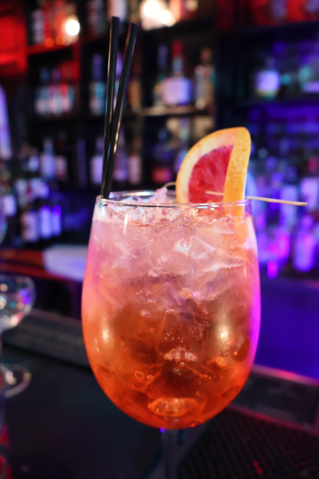 Cocktail with blood orange garnish