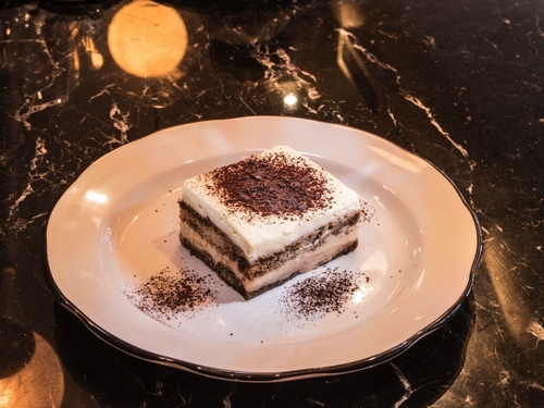 Tiramisu topped with cocoa powder